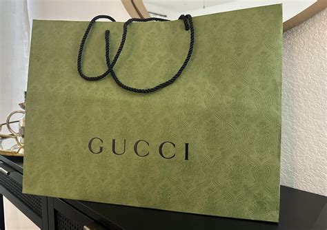 gucci collection invitation|white gucci shopping bag.